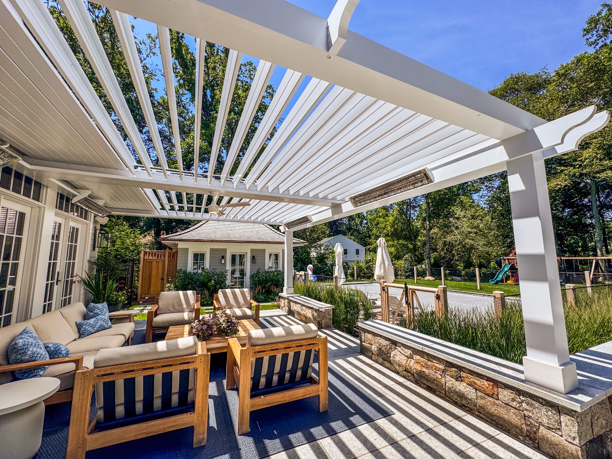 Classic colonial style pergola with decorative brackets